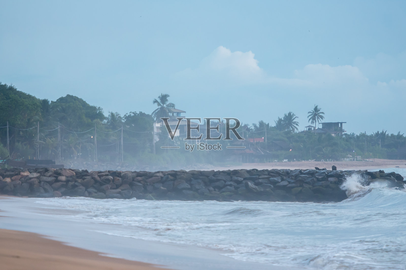 斯里兰卡坦加勒海滩上的日落。照片摄影图片