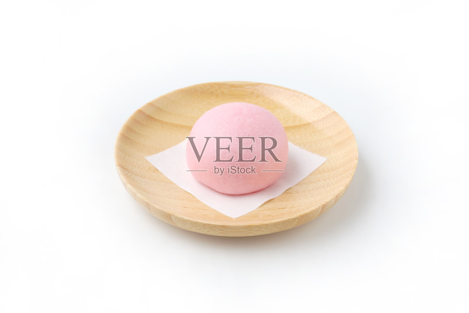 manjyu日本传统糖果蛋糕和花盘特写孤立在白色背景上照片摄影图片