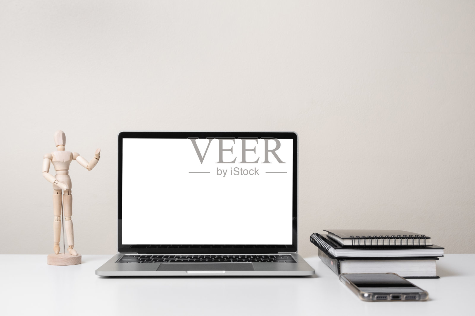 现代现代的工作空间,笔记本电脑,办公文具和供应桌上照片摄影图片