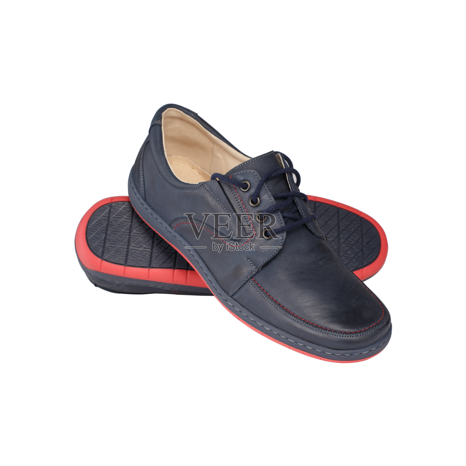 白色背景上的蓝色拖鞋照片摄影图片