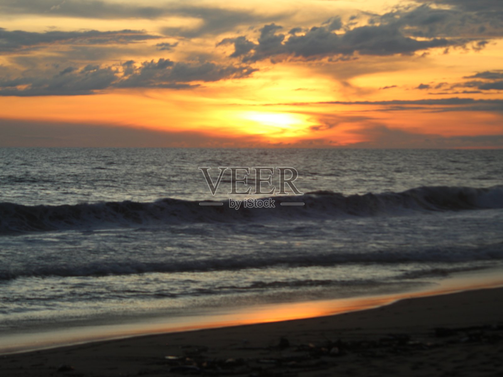 阿卡普尔科的皮亚德拉库斯塔海滩的日落照片摄影图片