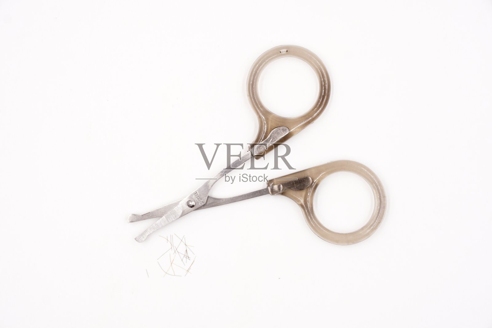 剪鼻毛的小剪刀照片摄影图片