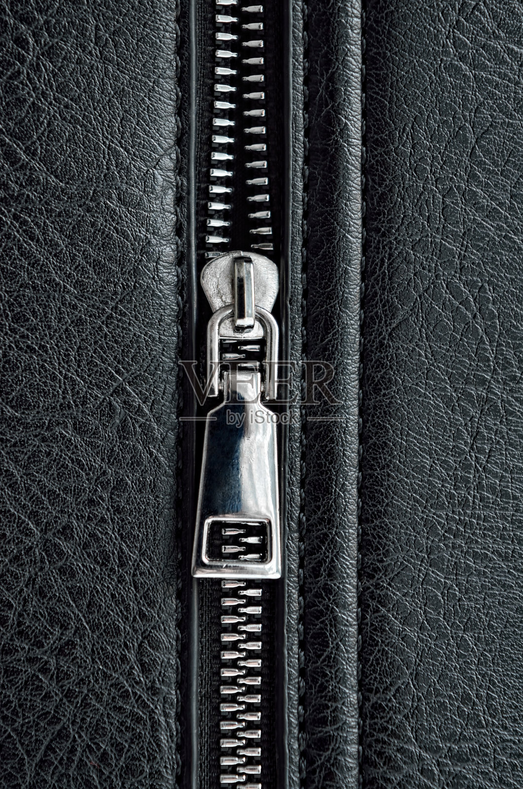 粗糙的黑色动物皮革纹理与拉链照片摄影图片