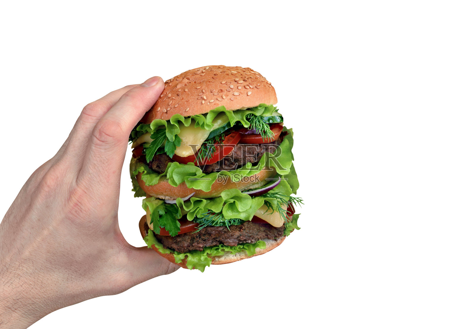 男子手中拿着一个大汉堡,白色背景照片摄影图片