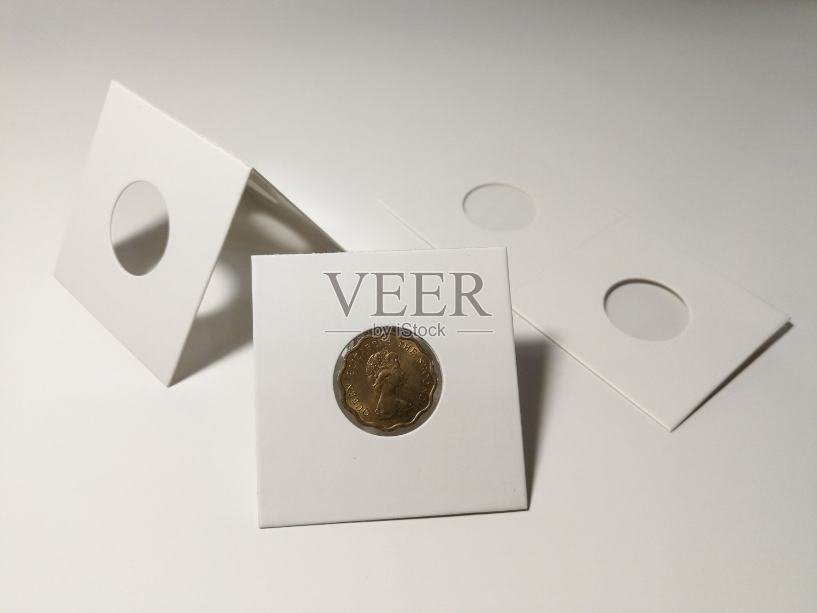 专业硬币持有人的钱币照片摄影图片