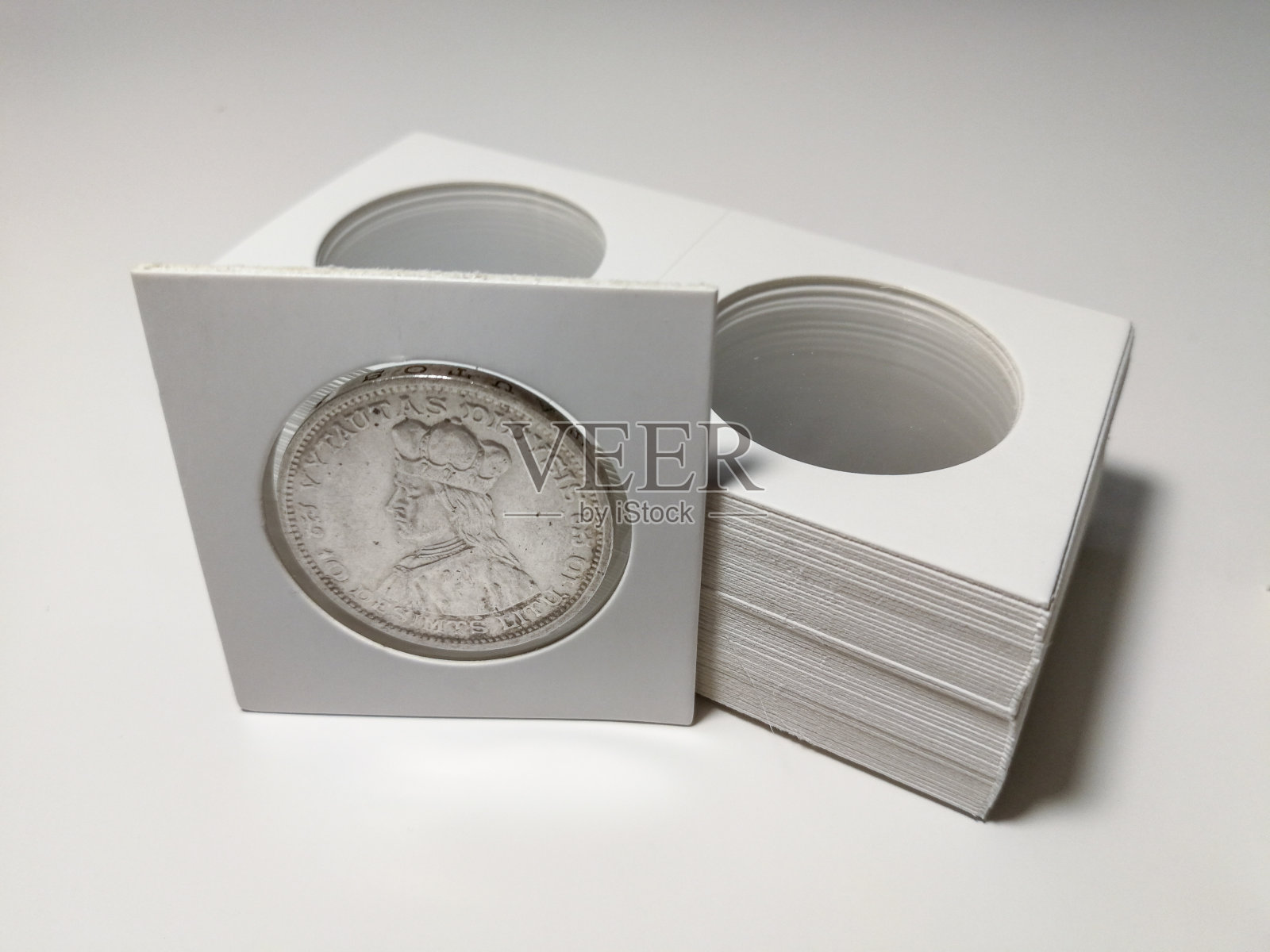 专业硬币持有人的钱币照片摄影图片