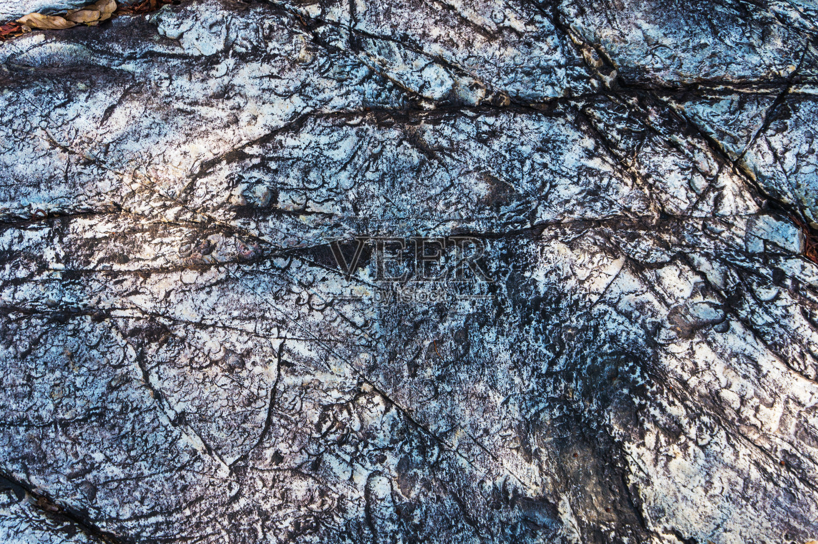 纹理用石材设计,岩石有裂缝。照片摄影图片