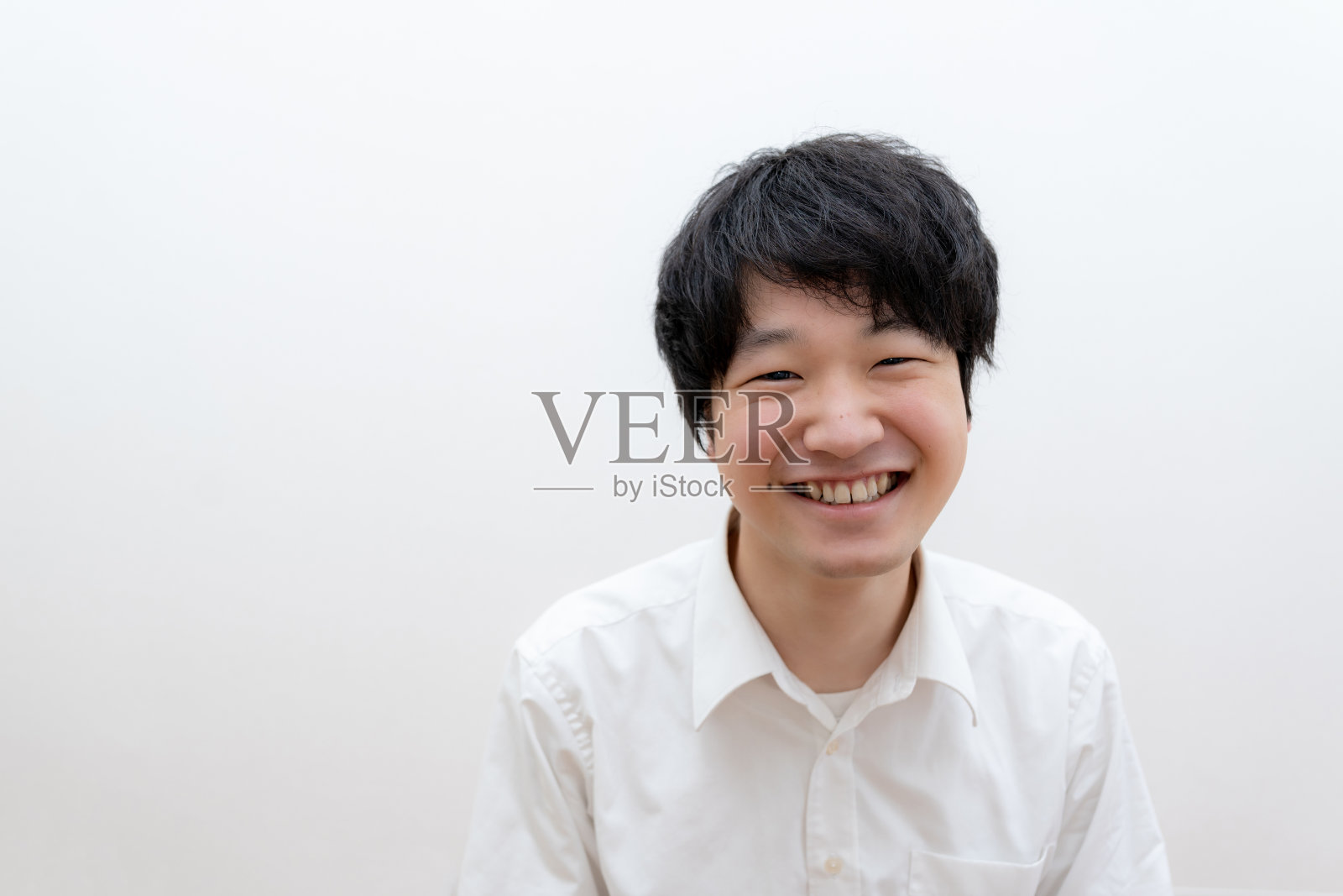 亚洲商人的肖像,微笑着照片摄影图片