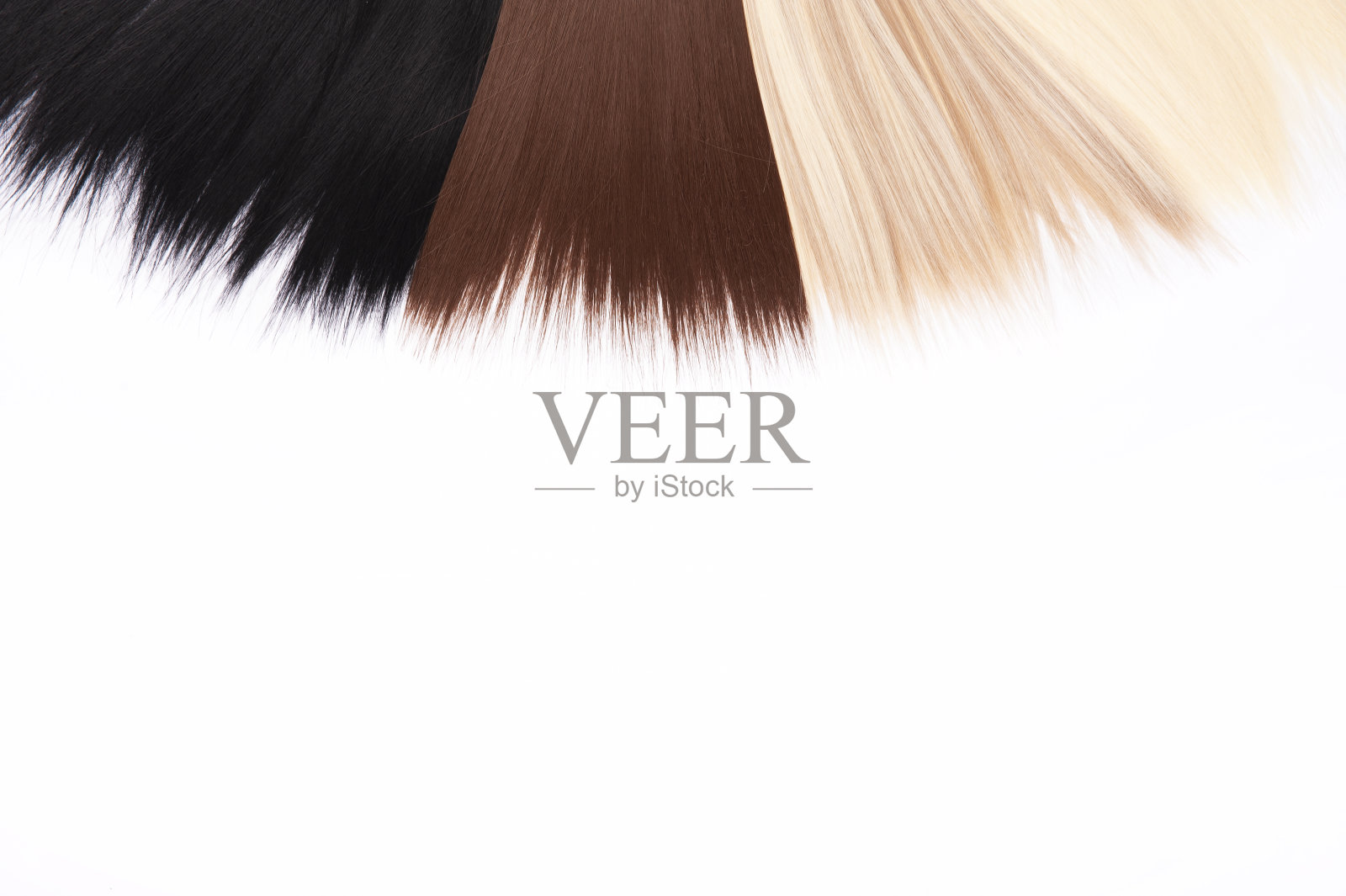 自然颜色的长发接发。黑色,棕色,金色和金色清扫。照片摄影图片