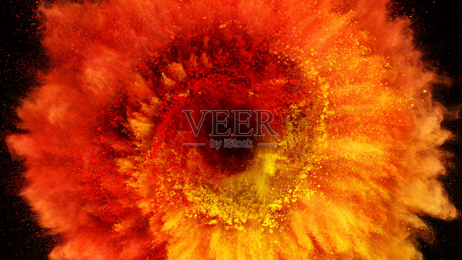 彩色粉末在黑色背景上爆炸照片摄影图片