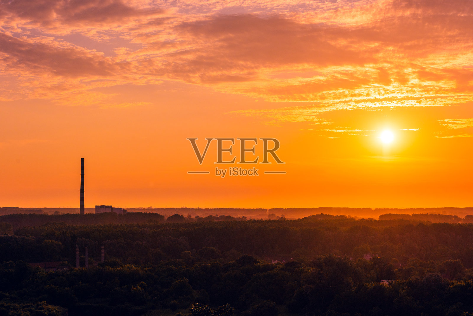 城市中的日落照片摄影图片