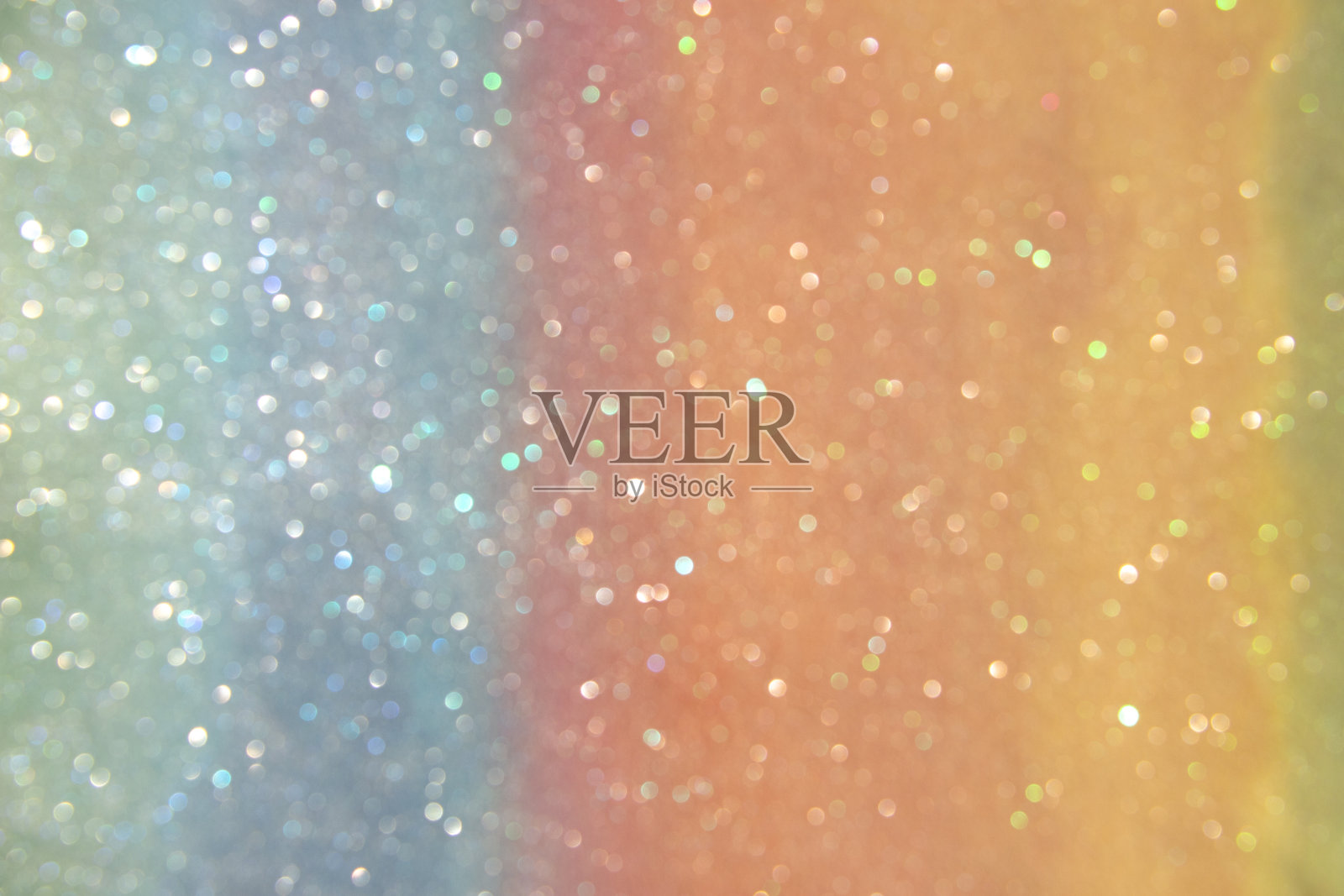 柔和的对焦,橙色背景上的散景。照片摄影图片