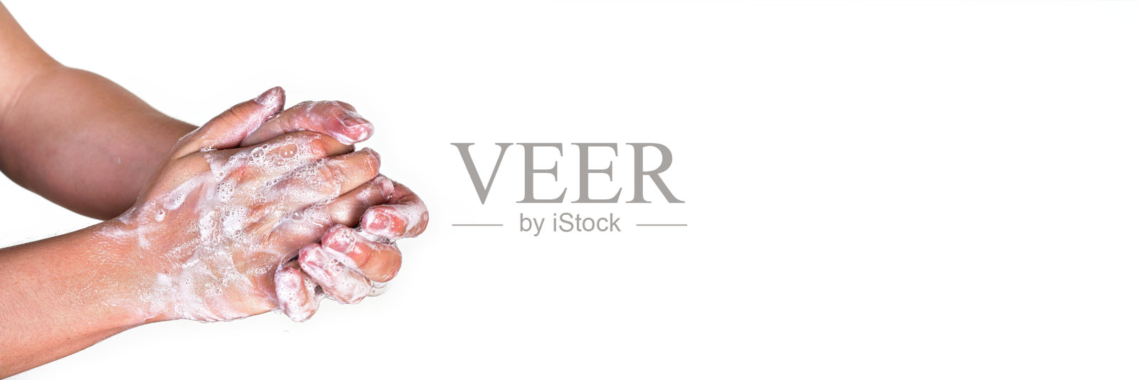 年轻人用肥皂洗手,宽横幅空间的文字右侧,孤立的白色。在预防新冠肺炎疫情期间是否可以使用照片摄影图片