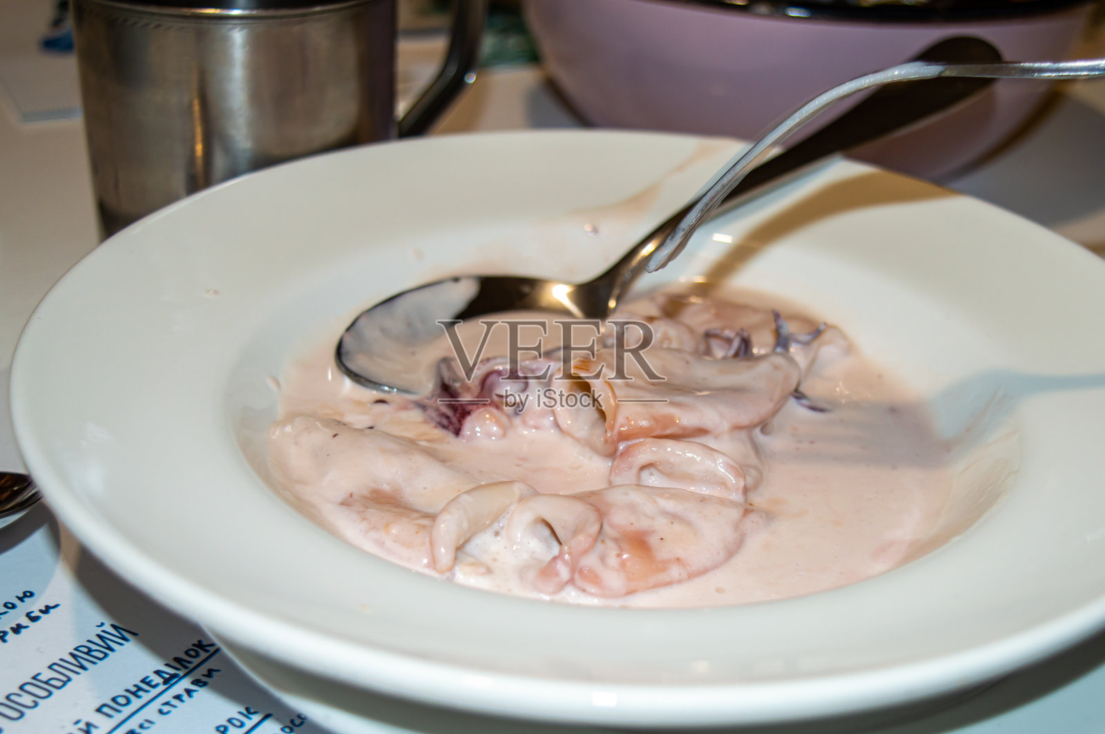 奶酪酱汁煮章鱼照片摄影图片