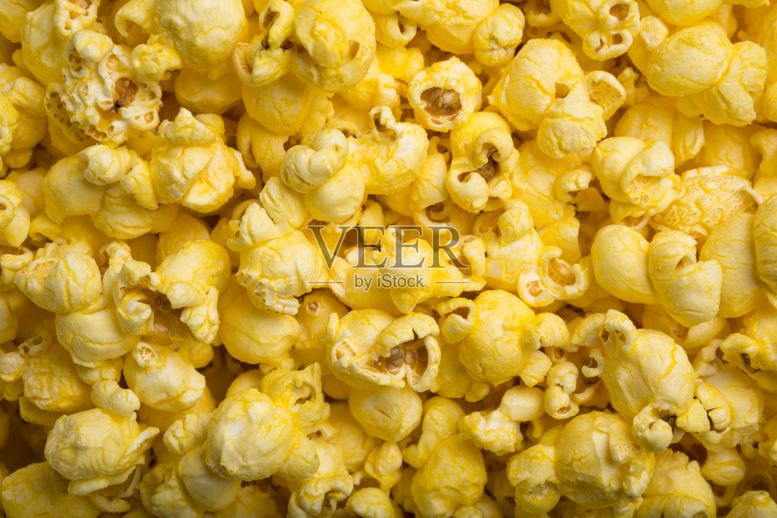 黄油新鲜自制爆米花纹理背景全框架照片摄影图片