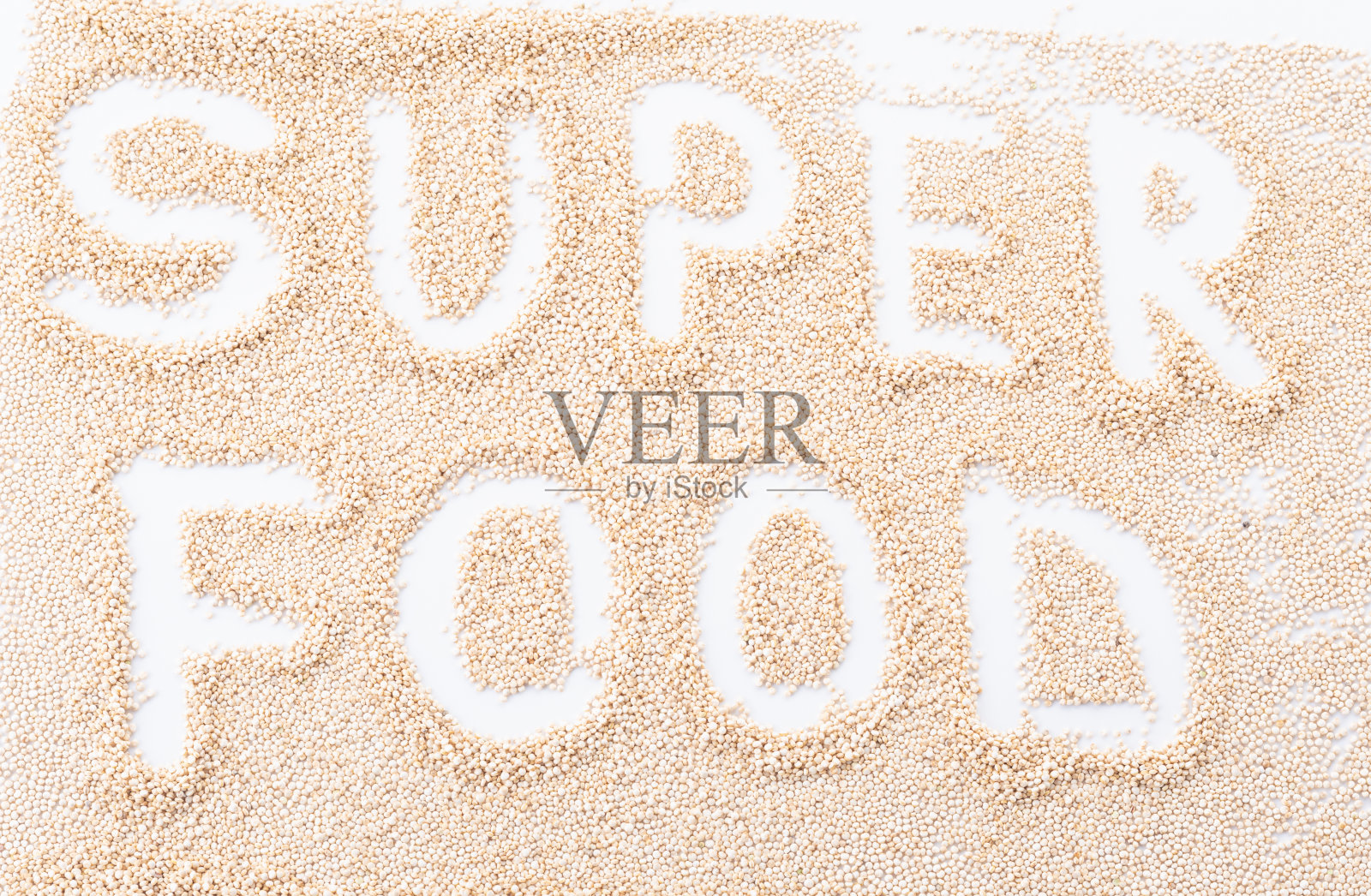 白色背景上的藜麦种子。词超级食物照片摄影图片