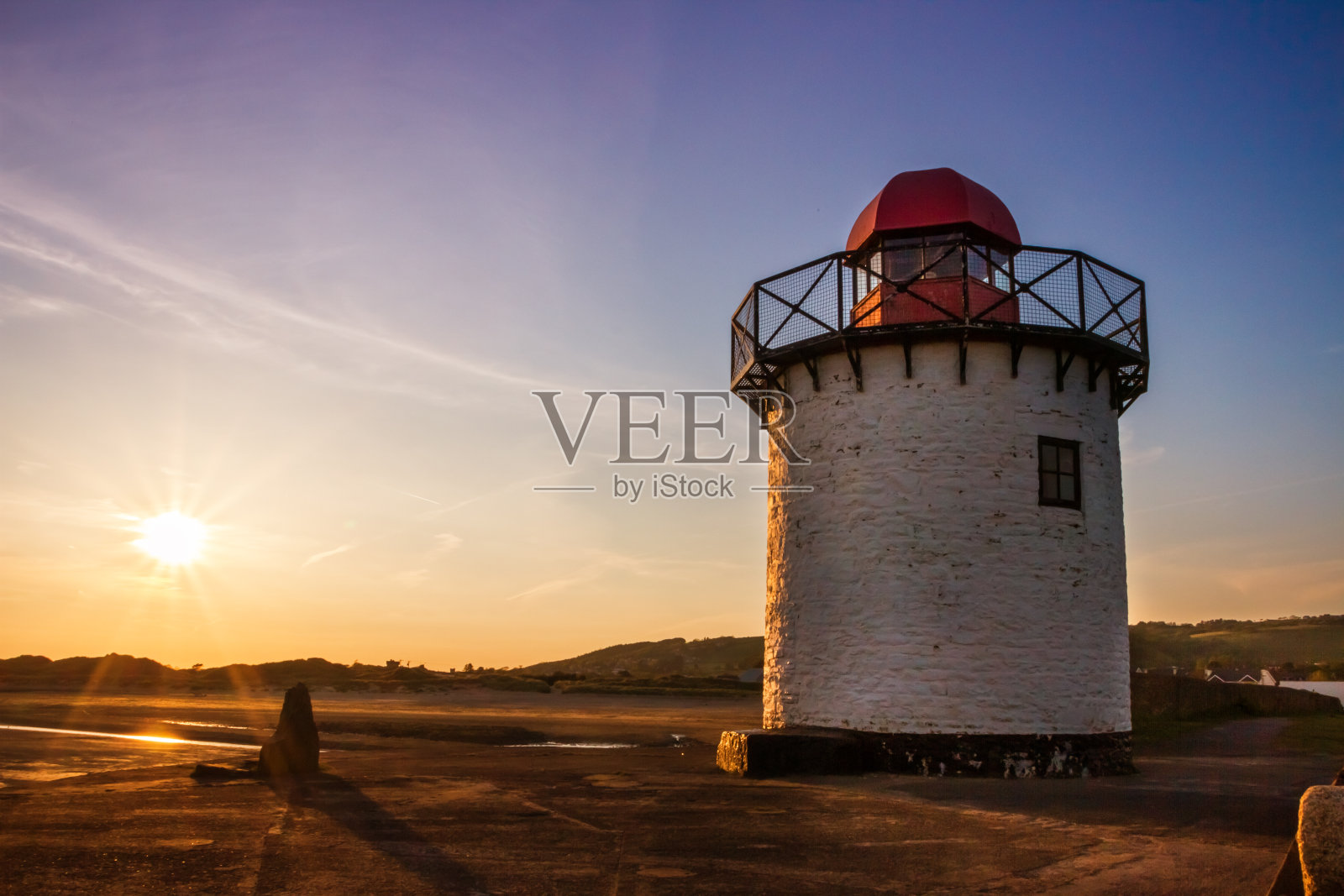 日落时的伯里港灯塔照片摄影图片
