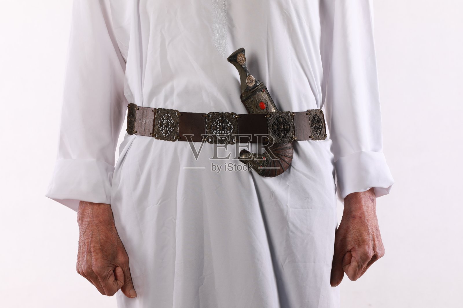 腰带上的阿拉伯匕首照片摄影图片
