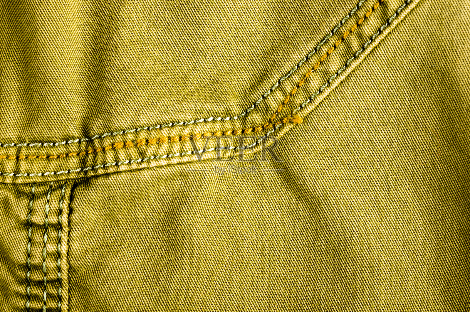 衣服项目石洗棉织物纹理接缝,扣,钮扣和铆钉,宏观照片摄影图片