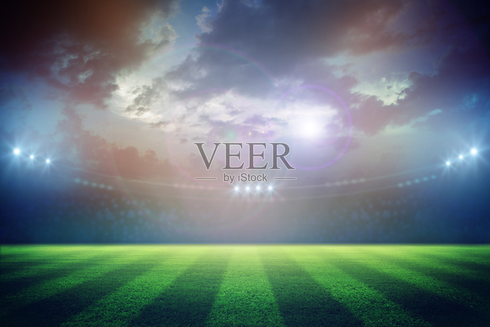 晚上的灯光和体育场的3D渲染。照片摄影图片