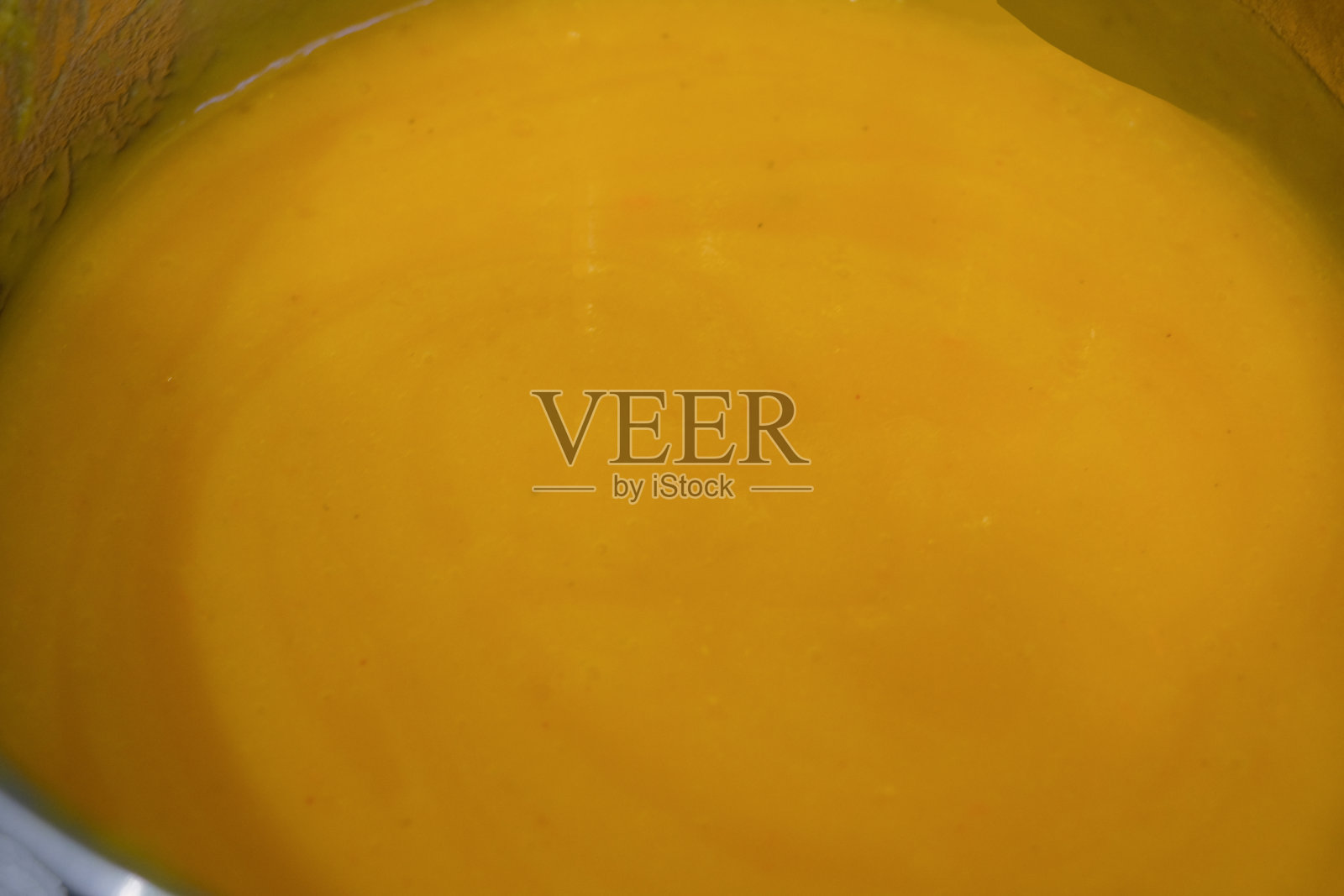 用平底锅煮南瓜汤照片摄影图片