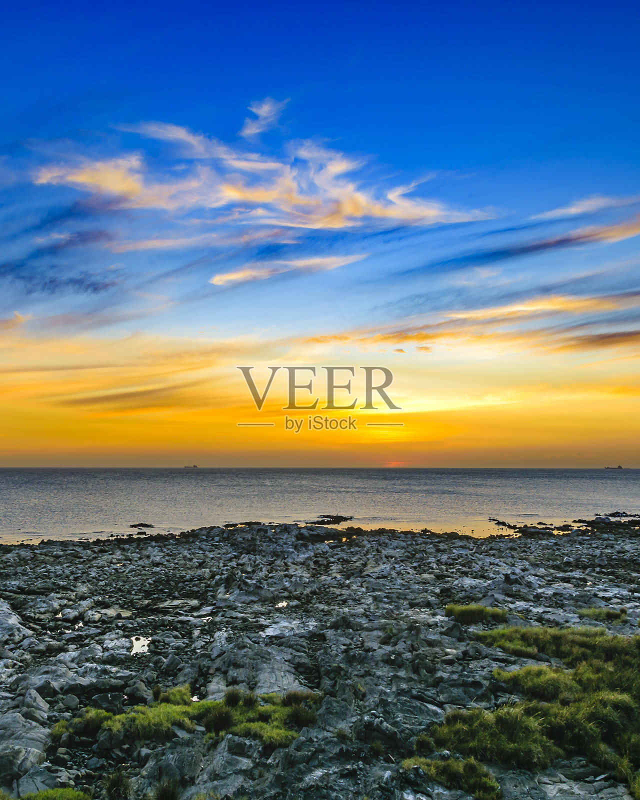 空海岸日落场景,蒙得维的亚,乌拉圭照片摄影图片