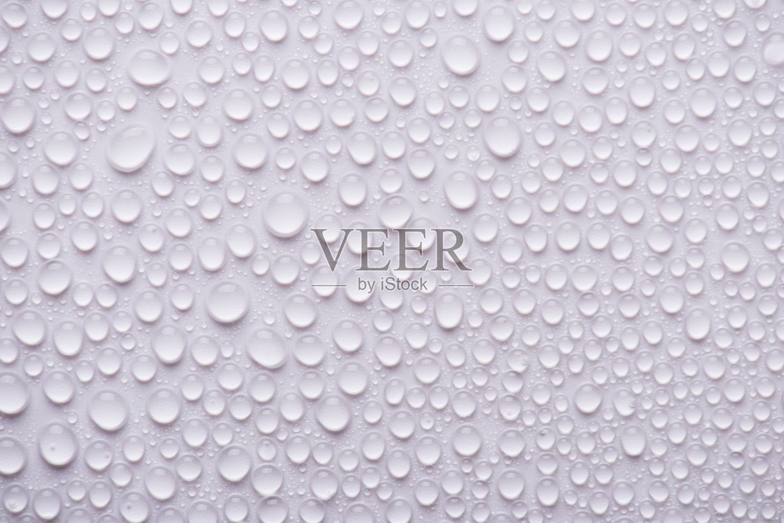 俯视照片的水滴在白色的背景照片摄影图片