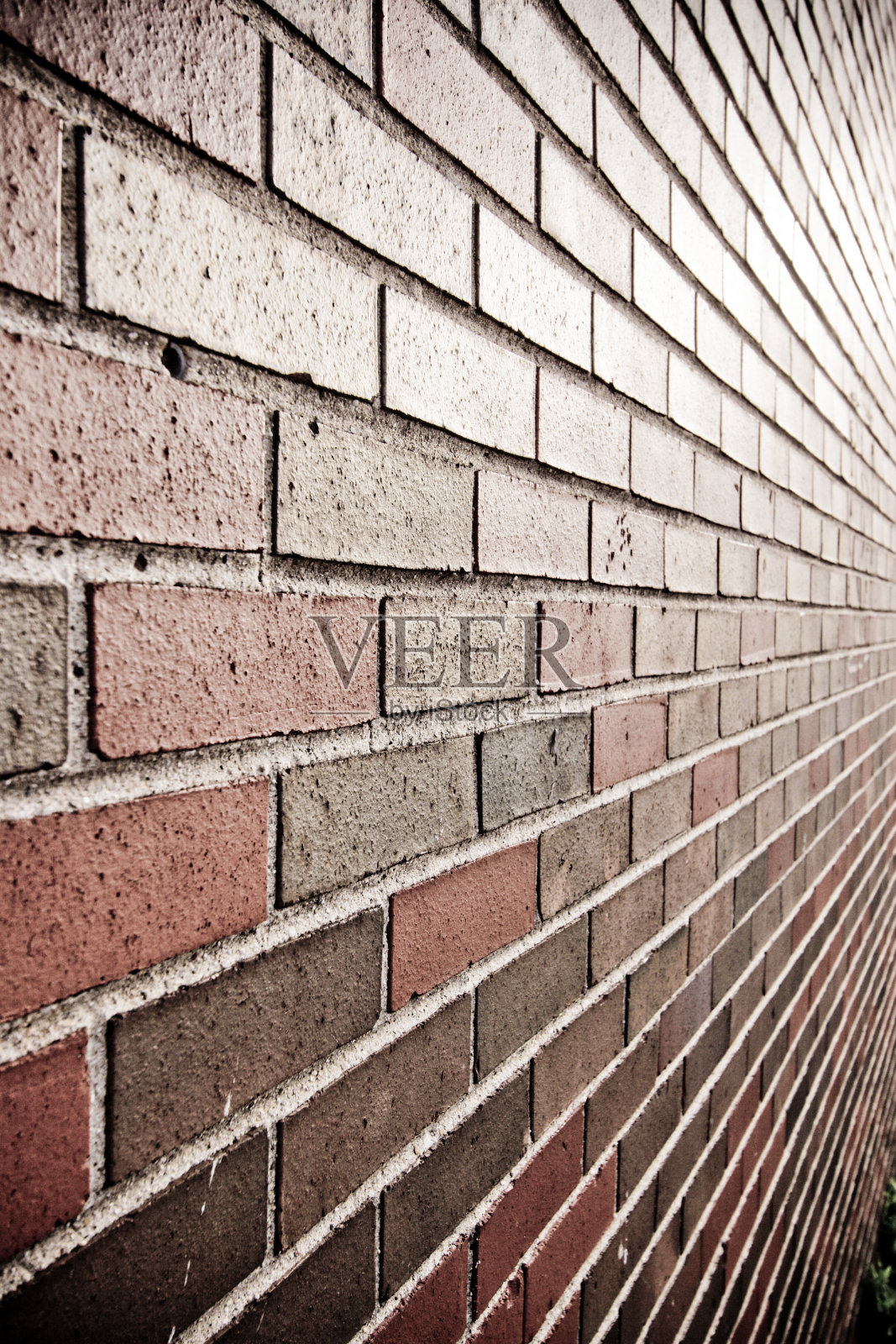 铁锈、红色和棕色的砖墙背景纹理。照片摄影图片