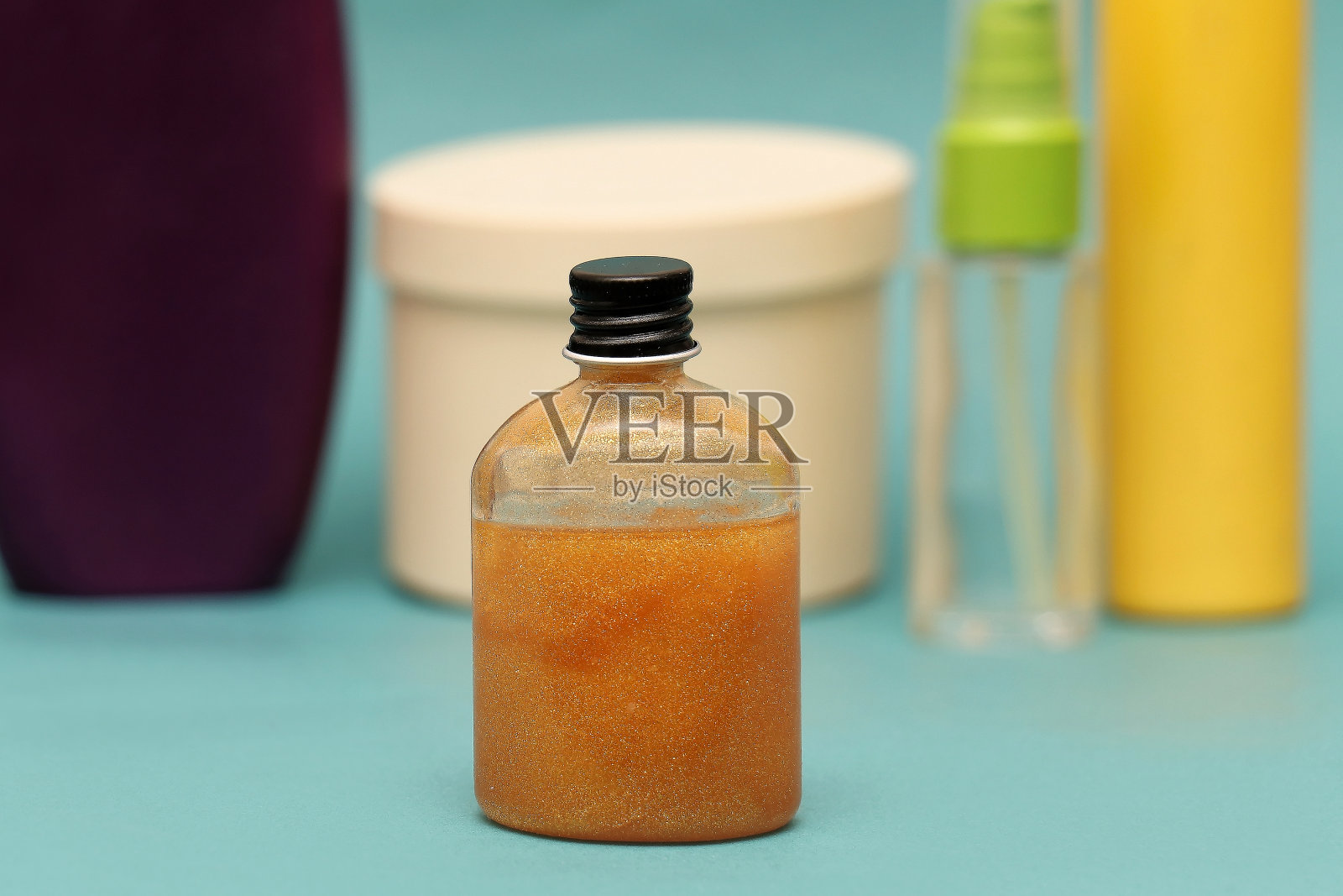 金色闪光的凝胶与模糊的背景照片摄影图片