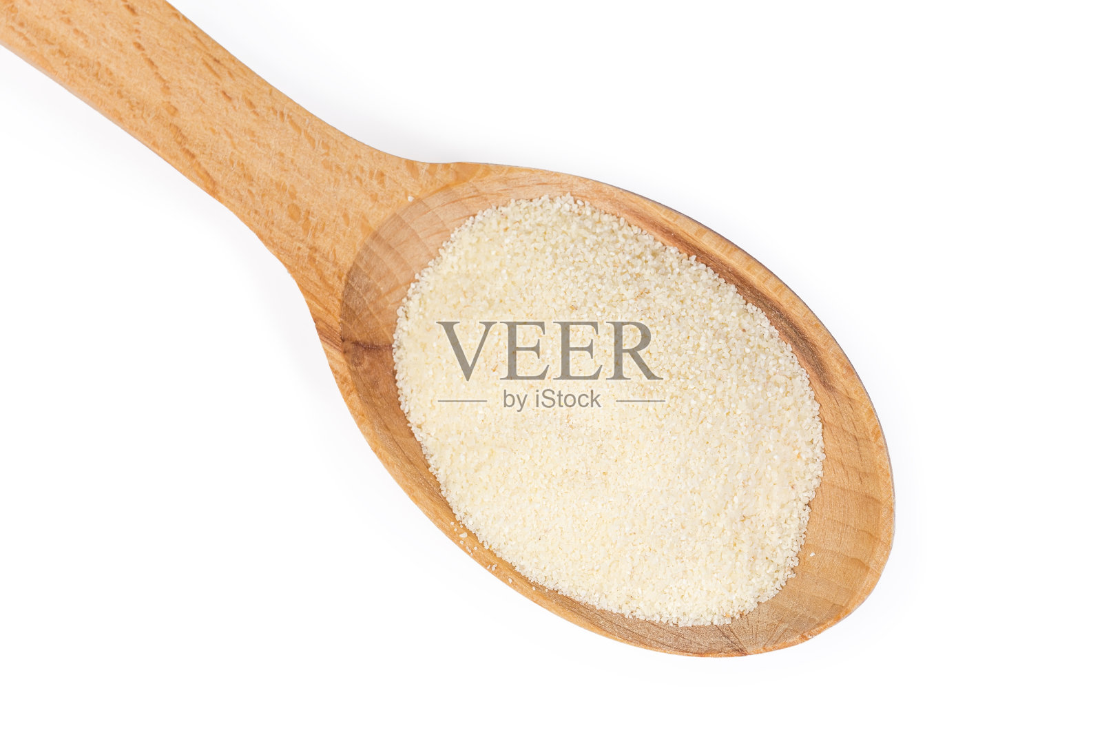 白底木勺里的生粗面粉照片摄影图片