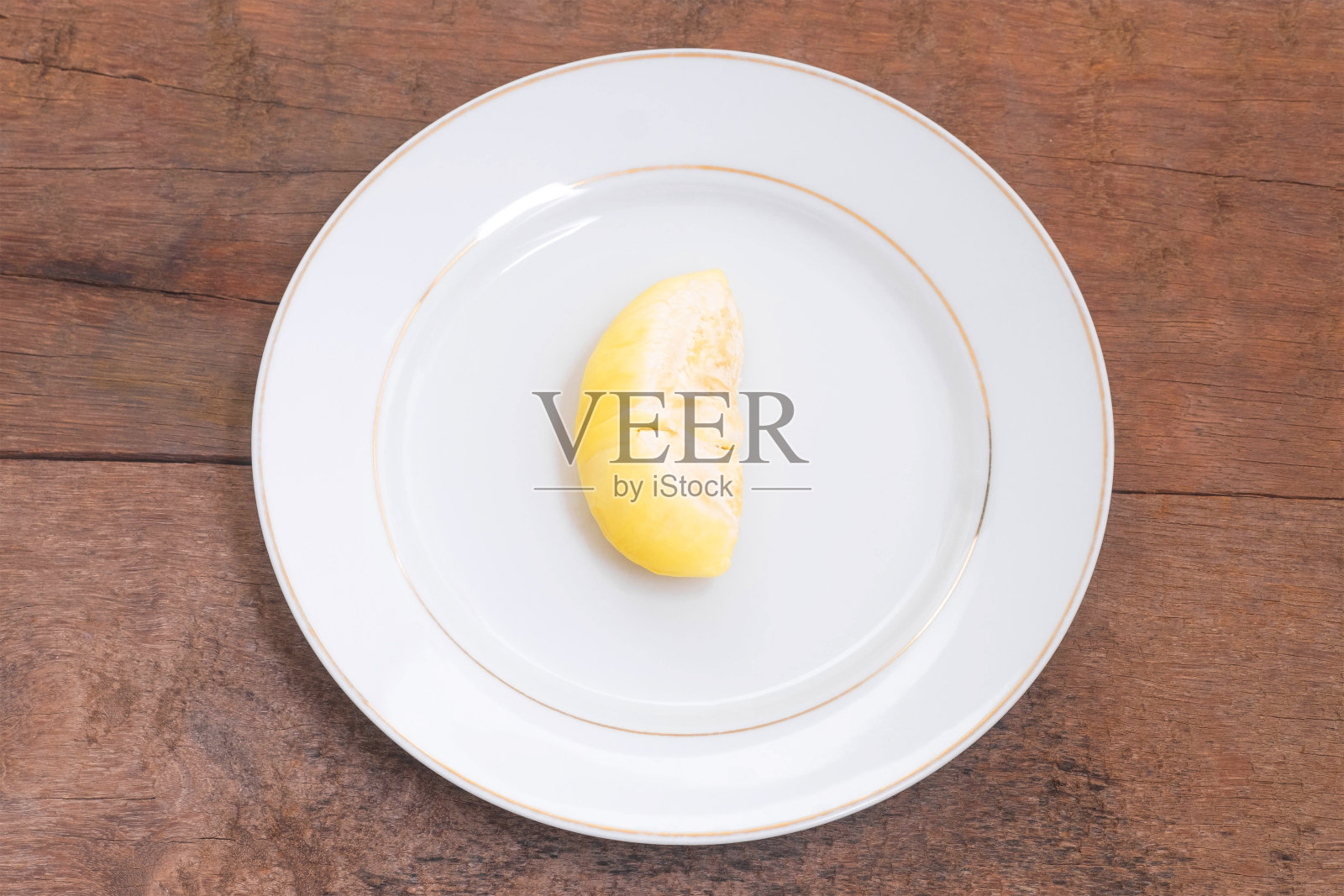 榴莲,水果之王,木质背景上的榴莲。照片摄影图片