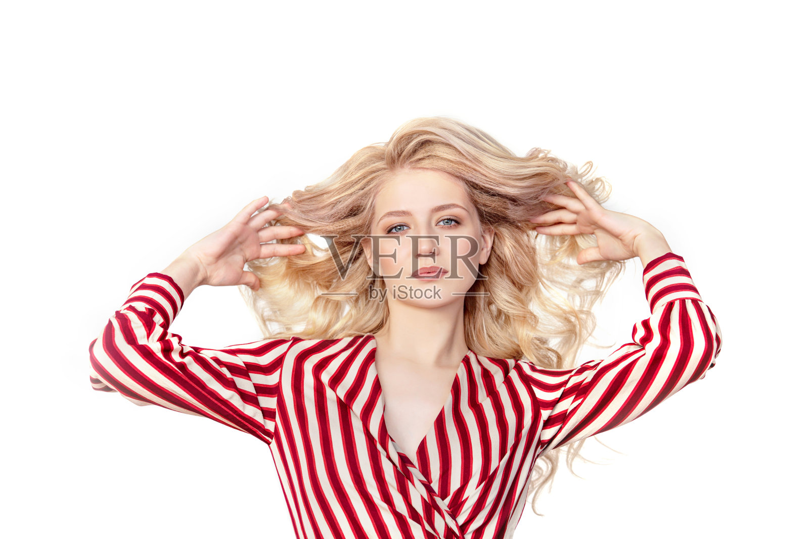 年轻美丽的女人模特时尚和时尚在一个白色的背景在工作室照片摄影图片