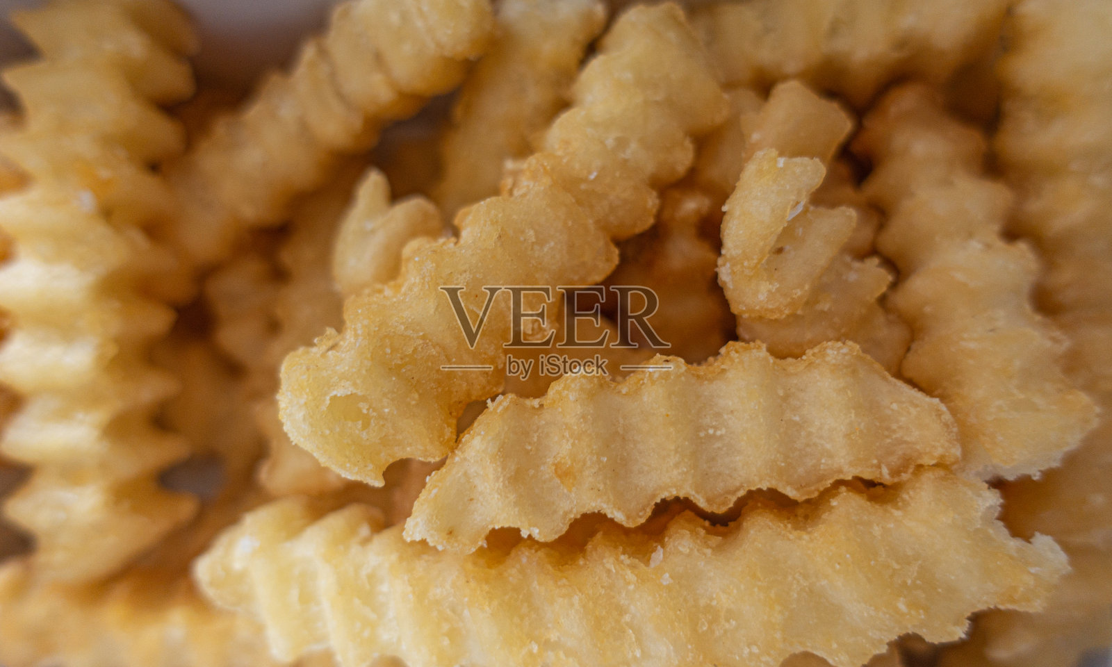 脆脆的薯条,近距离观看。照片摄影图片