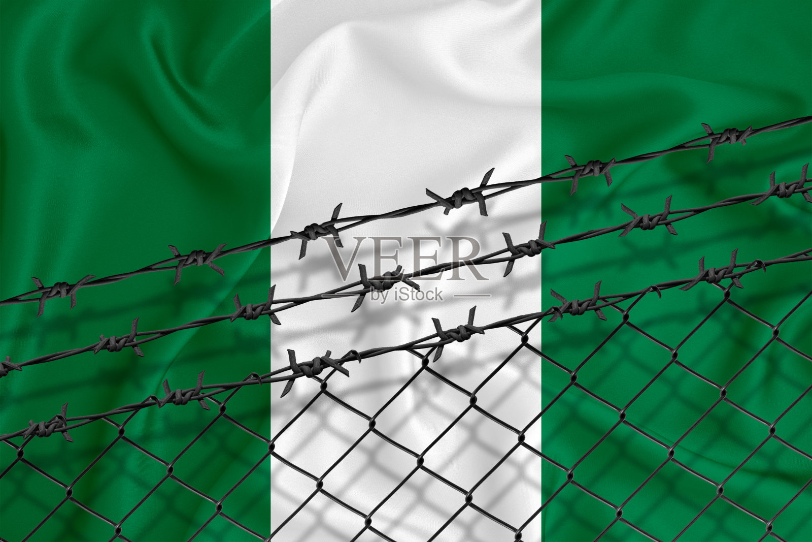 开发尼日利亚旗、铁丝网、铁丝网。移民孤立的概念。为你的文本。插画图片素材