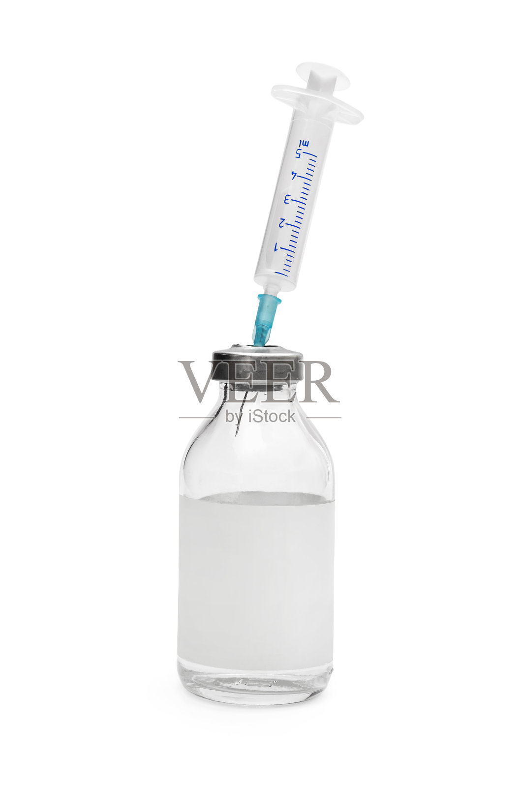 药瓶里的注射器孤立在白色的。照片摄影图片