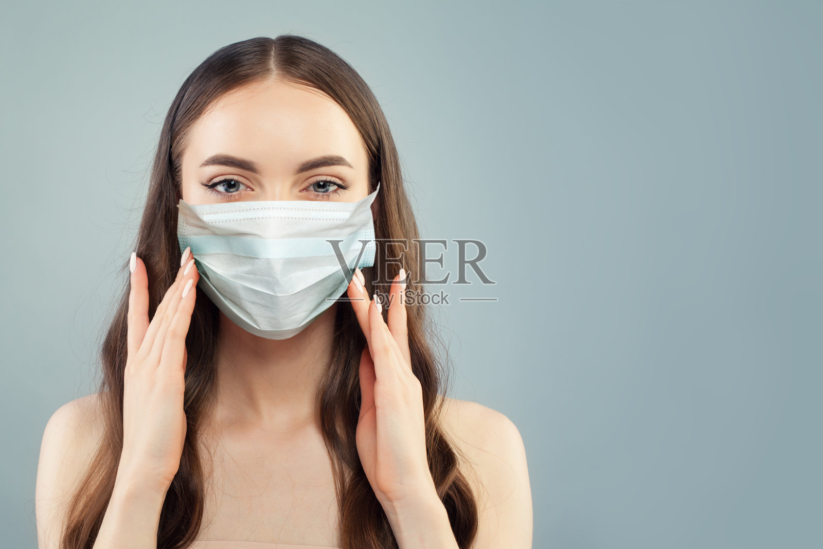 戴着防护面具的漂亮模特照片摄影图片