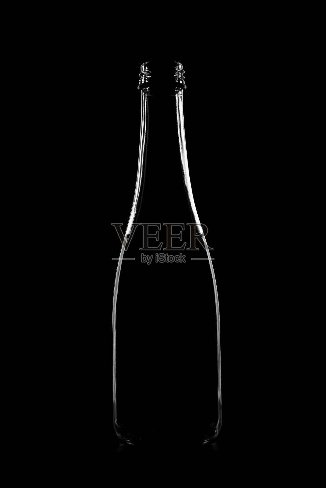 一个瓶子的轮廓与一个美丽的形状在一个黑色的背景照片摄影图片