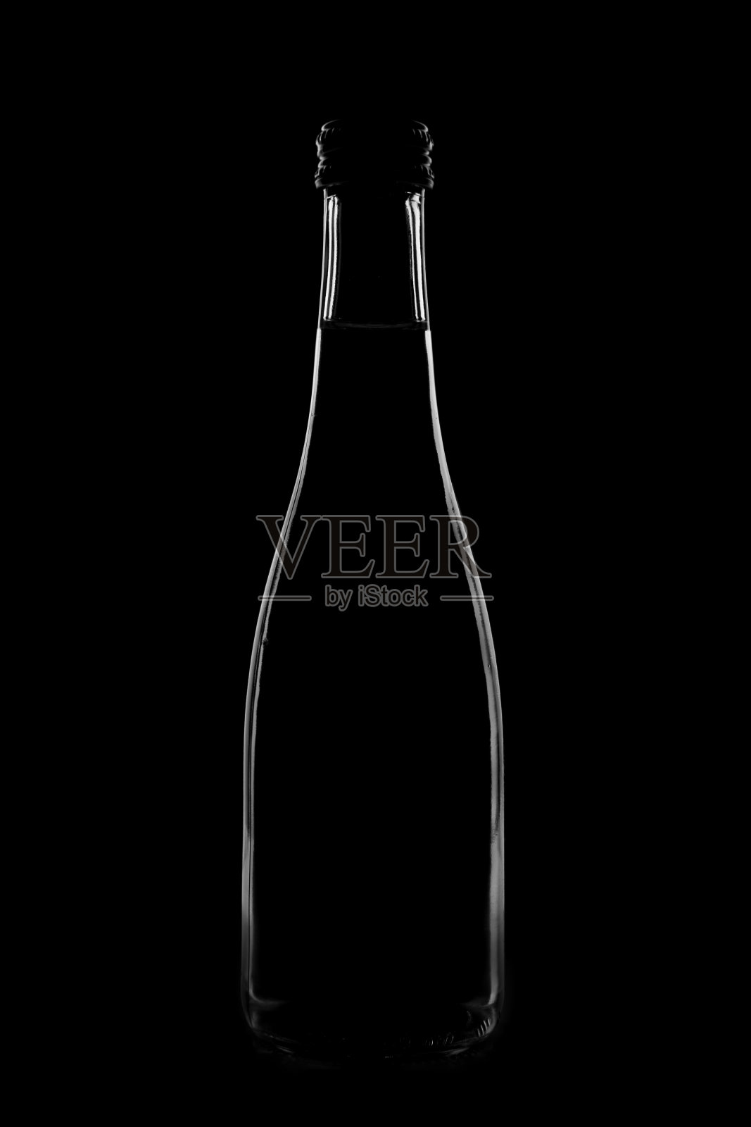 一个瓶子的轮廓与一个美丽的形状在一个黑色的背景照片摄影图片