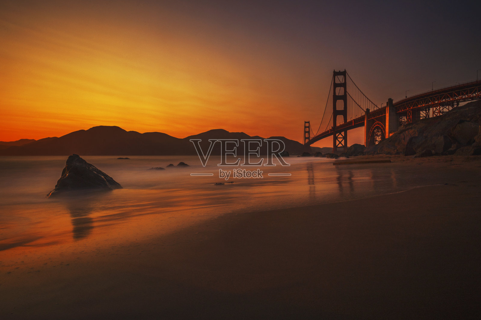 夕阳下的金门大桥照片摄影图片