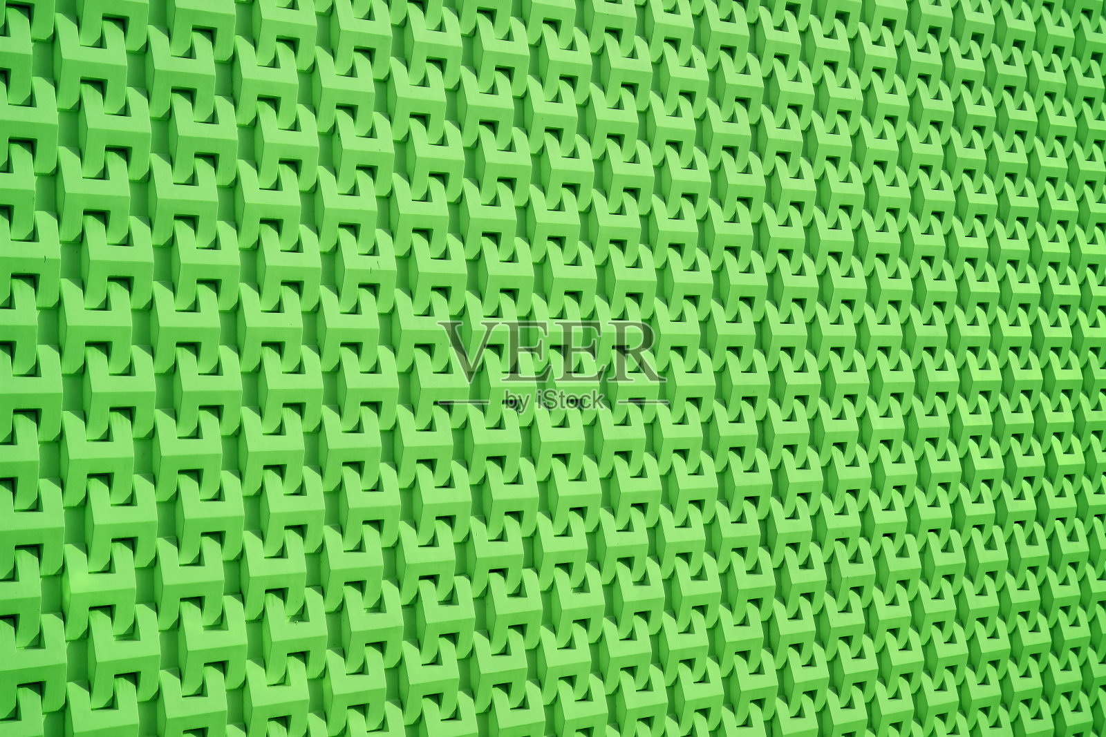 生动的绿色递减视角墙表面图案的背景和旗帜照片摄影图片