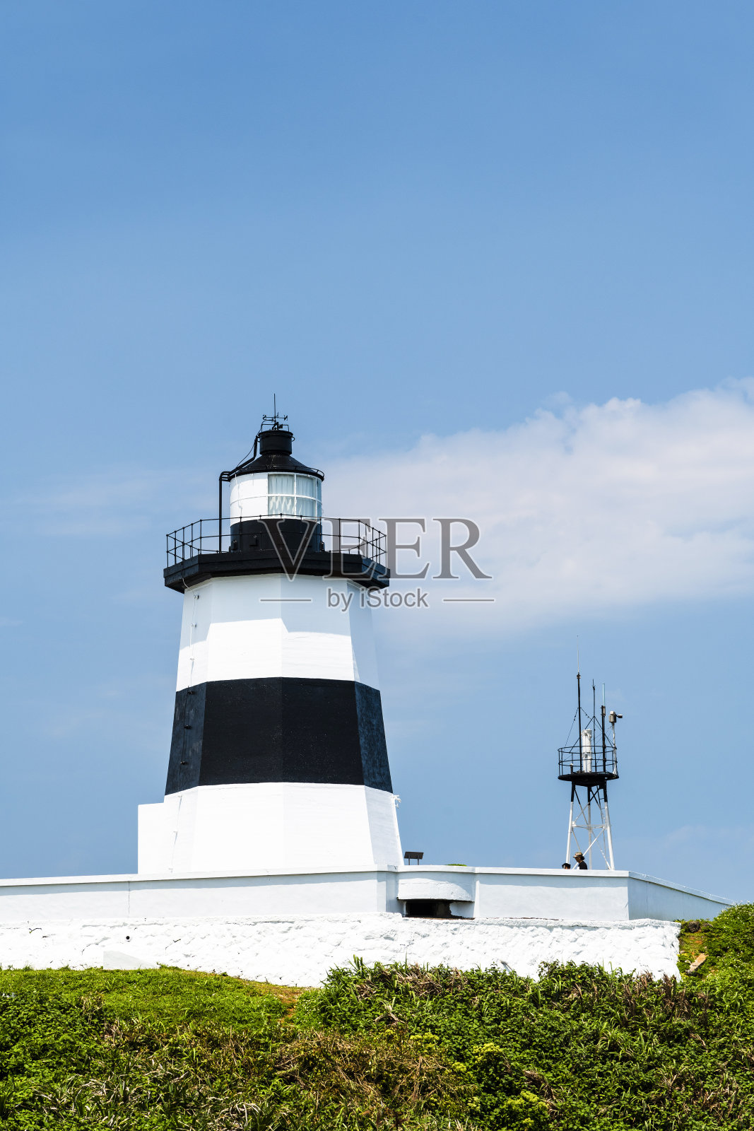 台湾新北市富贵角灯塔。照片摄影图片