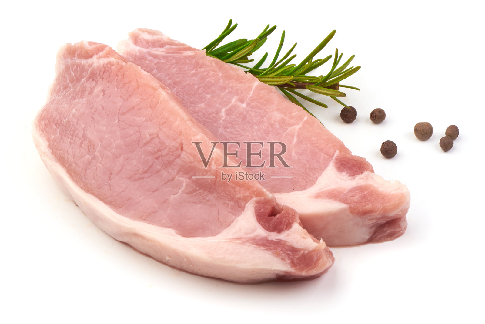 切片生猪肉排,孤立在白色背景上。照片摄影图片