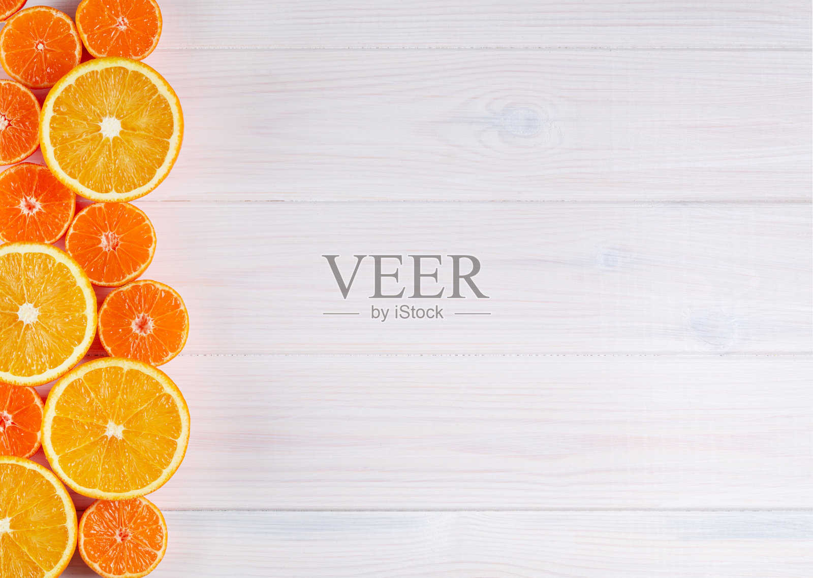 白木背景上的柑橘照片摄影图片