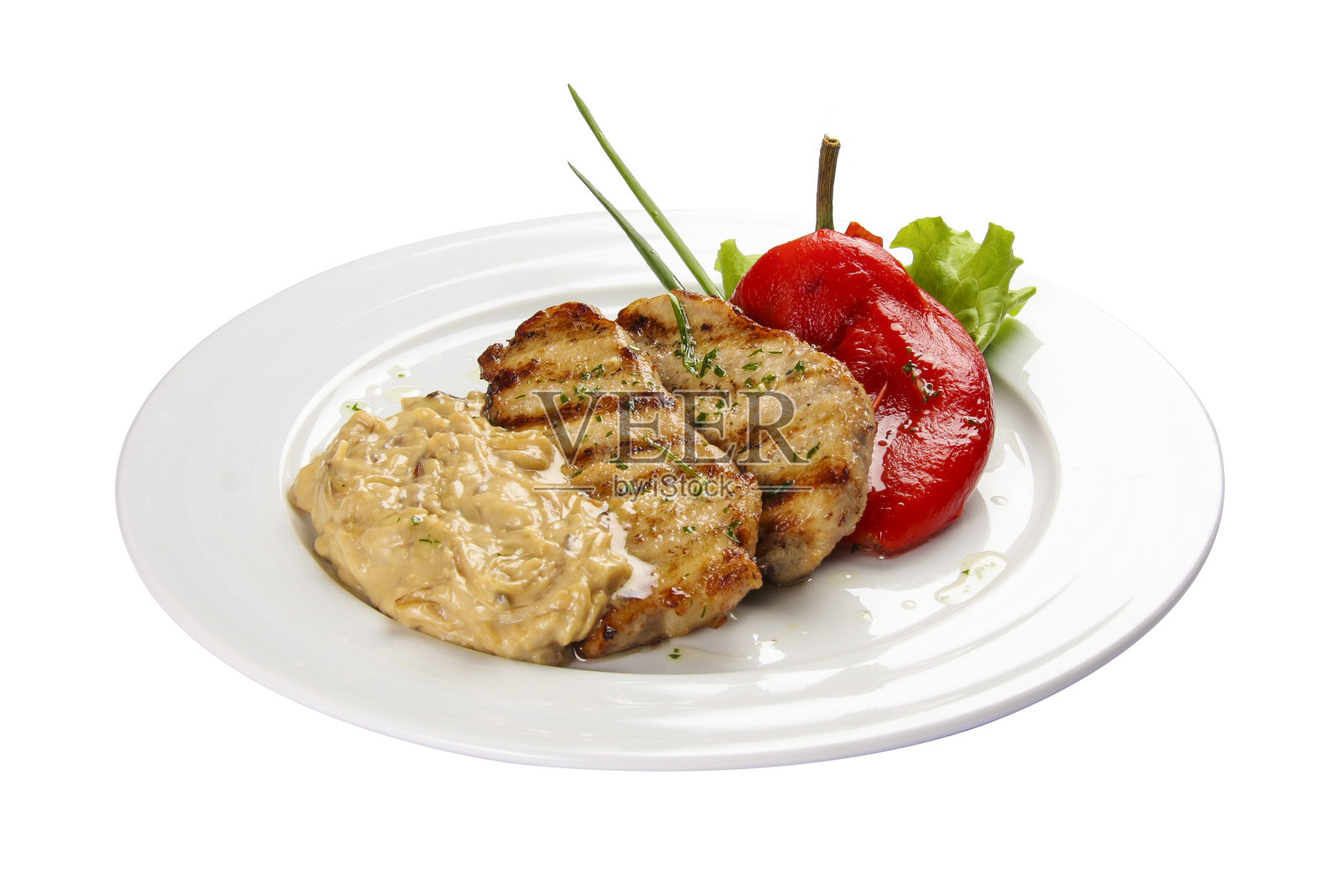 拉脱维亚风格的炸猪肉。在白色的背景上照片摄影图片