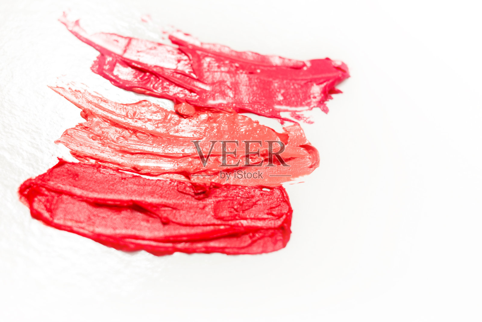 口红和唇彩,不同的色调和笔触创造不同的化妆形象照片摄影图片