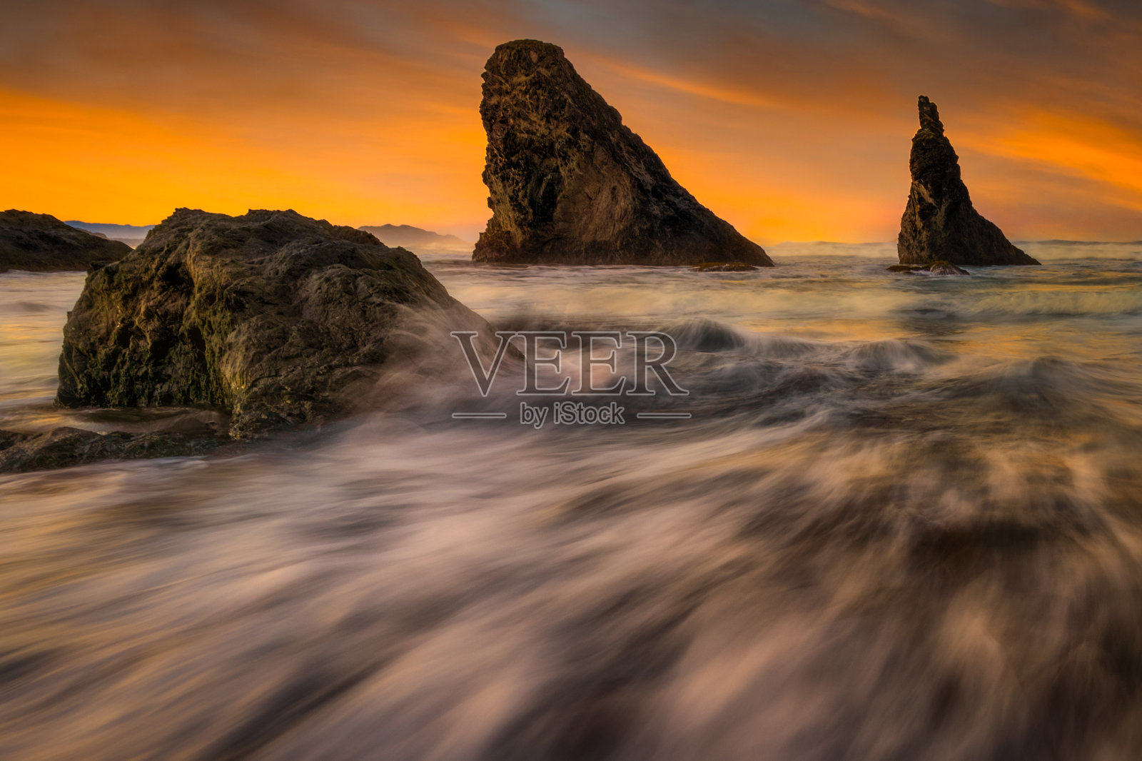 班登海滩的日落照片摄影图片