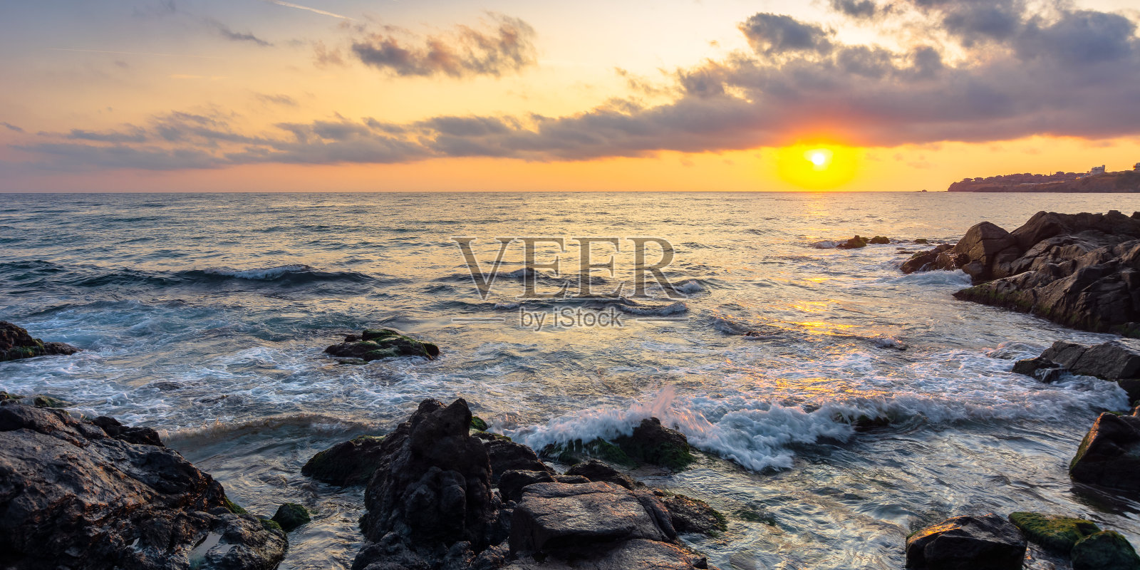 日落时的海滩照片摄影图片