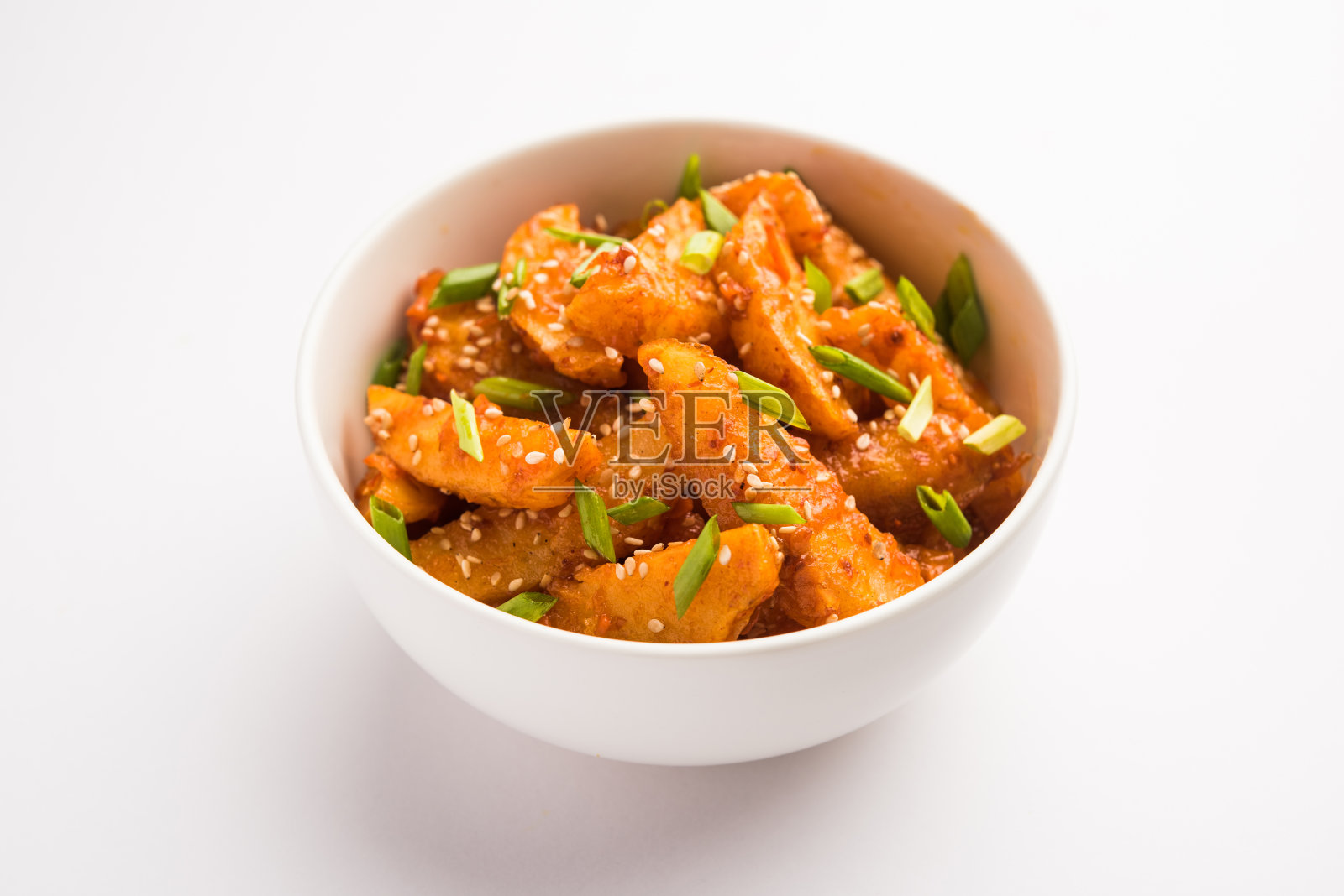 香脆的蜂蜜辣椒土豆是一种超级上瘾的印度中国菜小吃照片摄影图片