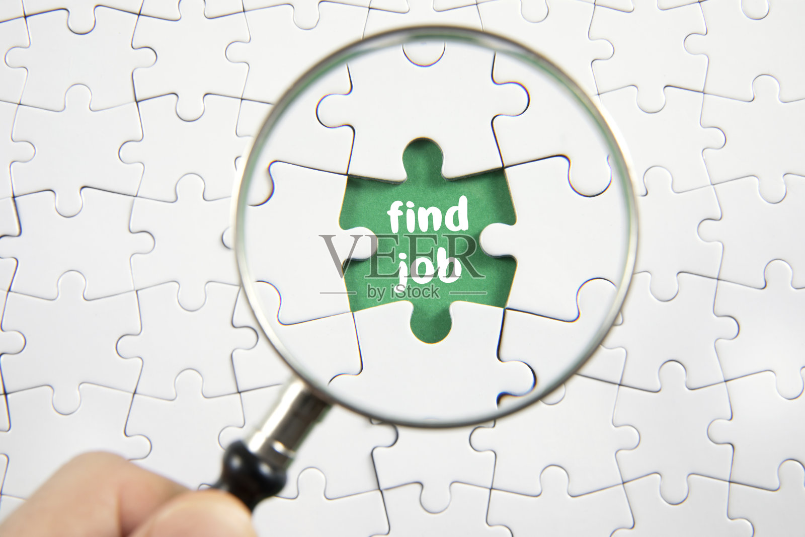 用拼图和放大镜找到工作概念照片摄影图片