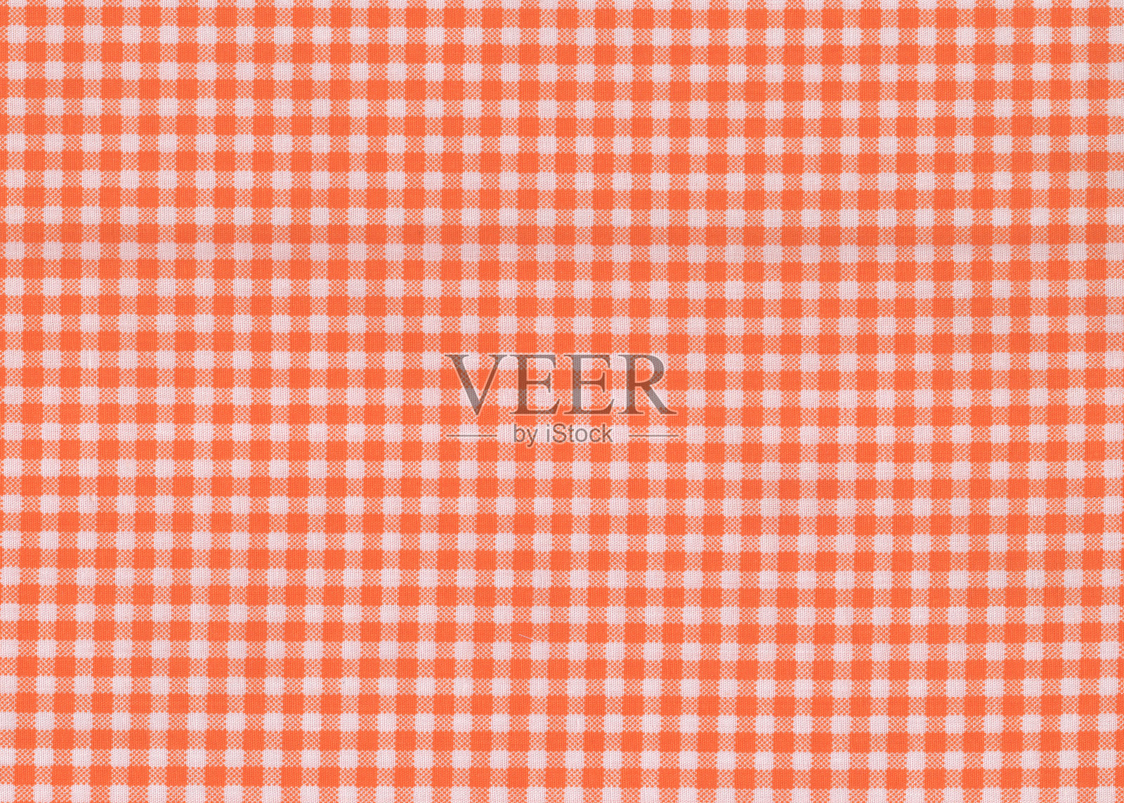 橙色纹理织物为背景。照片摄影图片